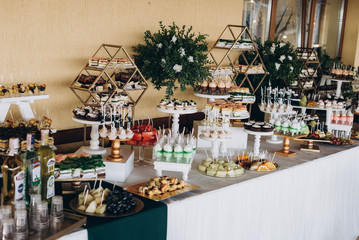 Buffet table at the wedding, sweet and fruits