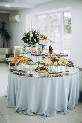 Buffet table at the wedding, sweet and fruits