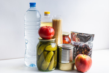 Donation for food delivery. Help with products during a crisis. Canned meat and fish, pickled tomatoes and cucumbers, vegetable oil, pasta, tea, water, apple, tomato.