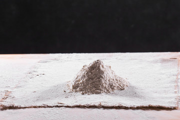 White flour on textile background texture photo