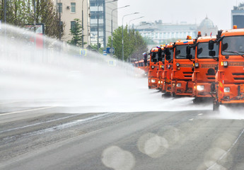 Disinfection truck city cleaning sweeper machines washes the city asphalt road