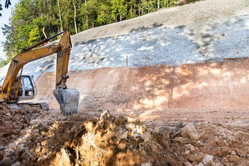 Slope retention construction work being carried out to manage landslide