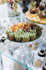 Buffet table at the wedding, sweet and meat