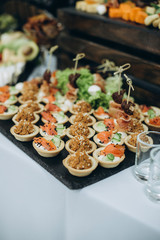 Buffet table at the wedding, sweet and meat