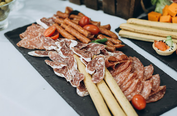 Buffet table at the wedding, sweet and meat