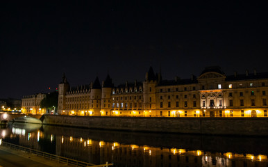 Fototapeta na wymiar Conciergerie is a former royal castle and prison in the very center of Paris in France at night