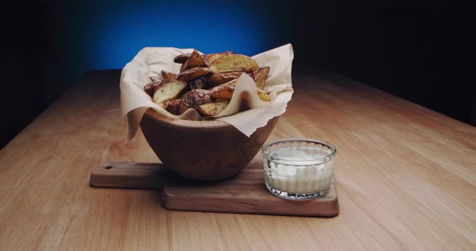 village style deep-fried potato slices with white sause
