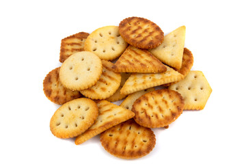 Portion of mixed crackers isolated on white background. organic crispy crackers