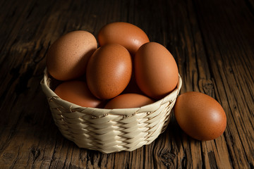 Organic white eggs in basket