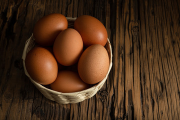 Organic white eggs in basket