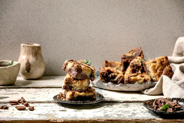 Trend baking Brookies chocolate brownies and cookies homemade cake sliced by squares in ceramic...