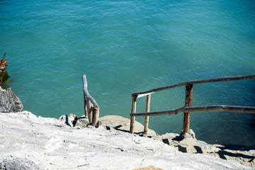 Steps into the water