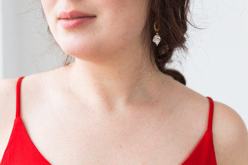 Obraz premium Elegant woman with earrings, close up portrait. Accessories, jewelry and bijouterie concept.