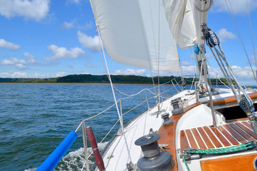 Sailing on a starboard tack in Northport Bay, Long Island, NY.  Copy space.