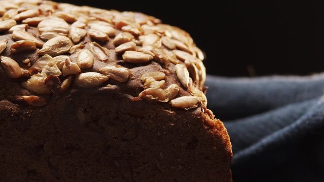 Panorama macro on rye bread with sunflower seeds