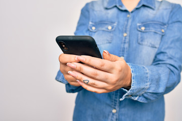Young caucasian woman having conversation using smartphone over isolated white background