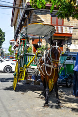 Fototapeta na wymiar Manila old town tour by horse-drawn carriage