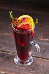 mulled wine on the wooden background