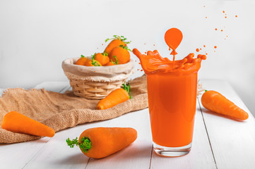 Creative. carrot juice. splashes and a balloon. bright, summer