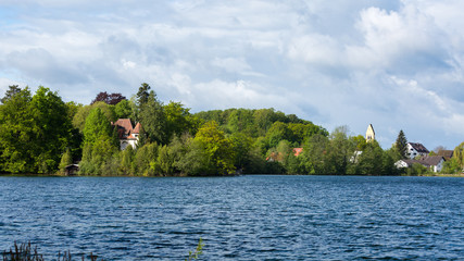 Lake Wessling with trees and church 