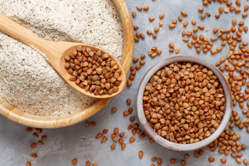 Buckwheat flour in a bowl and buckwheat grain