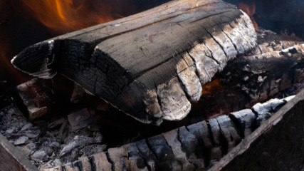 fire. the fire in the grill. cooking on the fire.