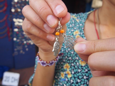 Souvenirs of Moroccan earrings, The Hand of Fatima or Khamsa, Essaouira, Morocco