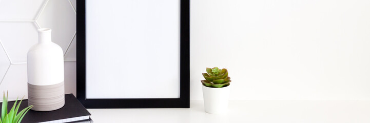 Office desk at home. Black frame mockup. Panorama