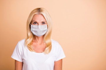 Closeup photo of middle age lady have breating mask good-looking stay home concept wear white...