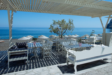 Beach chairs and umbrellas in Greece. Closed season 2020. 