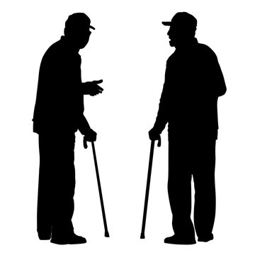 Two Elderly Men With Cane Standing And Talking To Each Other