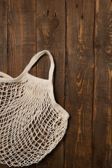 Fototapeta premium wicker bag on wooden background