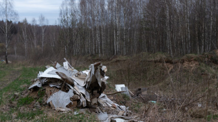 environmental pollution. garbage dump. people's indifference to natureempty bottles, garbage, construction waste