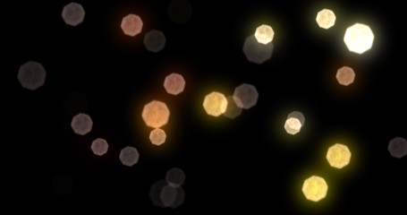 Bokeh light gold shine glares and particles glitter background. Abstract golden bokeh light sparkles, glowing shiny defocused light blur spots on black background