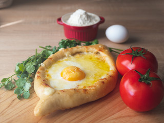 Khachapuri - traditional Georgian cheese and egg filled bread.