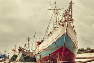 Group of big old ships in Sunda Kelapa old Harbour, Indonesia.