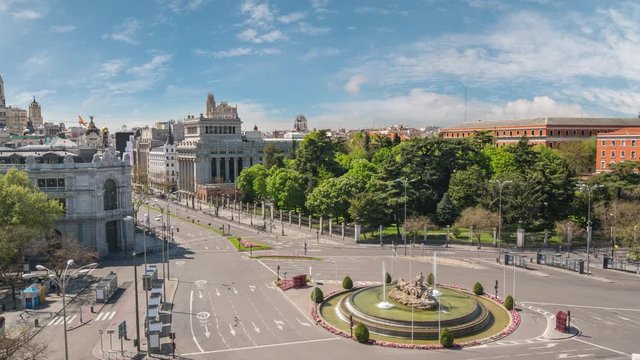 Madrid Spain time lapse 4K, city skyline timelapse at Independence Square and Cibeles Fountain nobody empty due to Coronavirus Covid-19 lockdown
