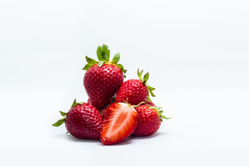 Fresh strawberries closeup isolated on white background.