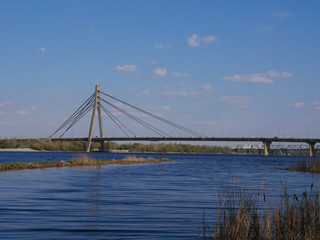 North Bridge Moscow Bridge across Dnieper River from Obolonskaya Embankment ,Kyiv Ukraine.