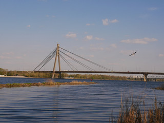 North Bridge Moscow Bridge across Dnieper River from Obolonskaya Embankment ,Kyiv Ukraine.