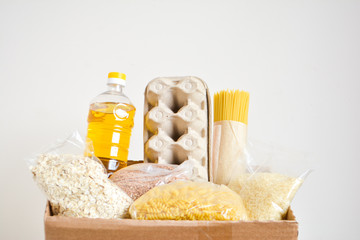 Food delivery, donation box, food box. Long-term storage products. Food supplies for the period of quarantine isolation.