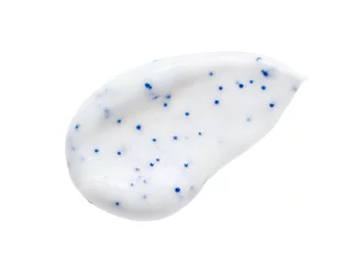 Tuinposter White face scrub cleanser smear smudge isolated on white background. Skin care exfoliating product swatch. Cosmetic mask creamy texture with blue particles © Kat Ka