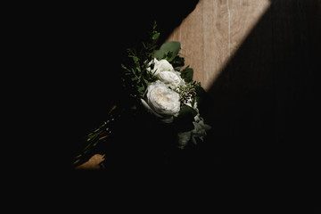 wedding bouquet in a vase,beautiful stylish wedding bouquet with beautiful flowers,floristry of a wedding bouquet,the bride's bouquet
