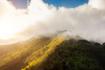 Beautiful of multiple mountains valley at sunrise in the morning at Phu chi Duen, Chiang Rai Province, Thailand