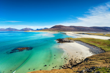 The beautiful sandy beach and clear turquoise sea at Seilebost