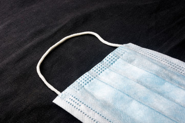 Background concept for news about the novel coronavirus COVID-19 pandemic, antiviral medical mask...