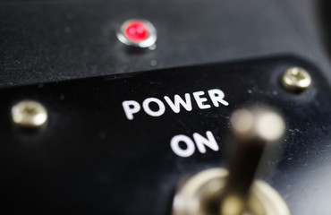 Economy stimulation and lockdown termination concept: View beyond joystick of retro control panel...