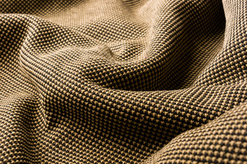 clothing items stonewashed cotton fabric texture with seams, clasps, buttons and rivets, macro