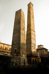 Two of most famous towers in Bologna, Italy: Torre degli Asinelli and the Torre Garisenda. Asinelli tower was built in the 11th century. It is over 97 metres tall, making it the tallest in Italy. © melnyksergey