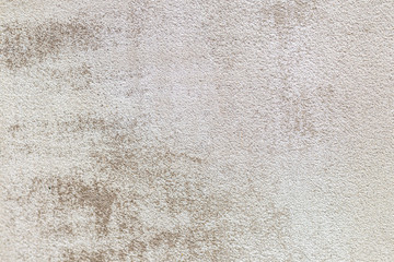 Old concrete wall, natural texture. Light background. The shadows.